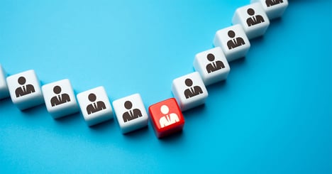 an employee or a leader standing out